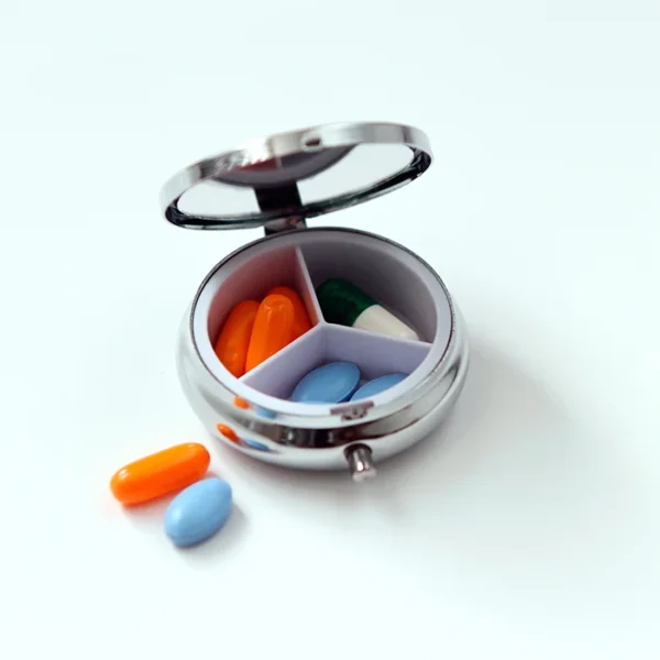 Pastillero con espejo.