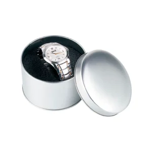 Estuche metálico redondo.